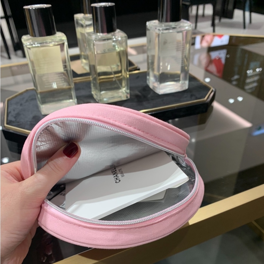 Authentic brand new gorgeous  round Chanel pouch with zipper . Must have!